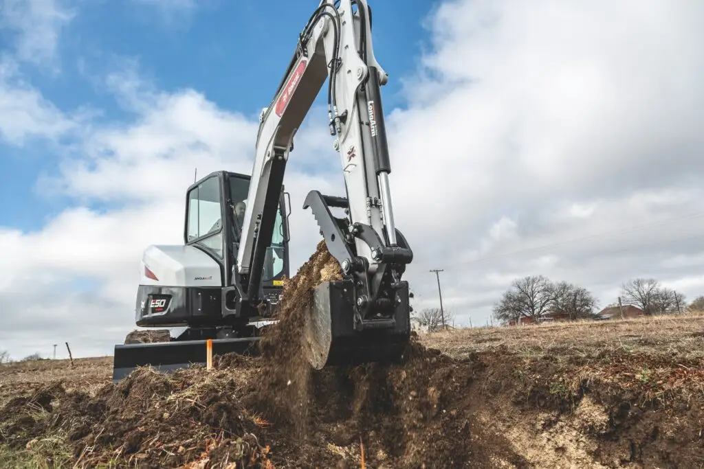 bobcat-e50- digging a trench